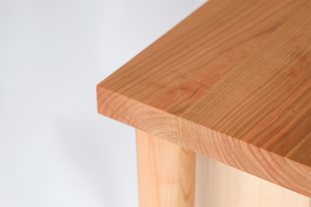 Wald desk: Tabletop corner; original design reference, not Gulmohar teak finish
