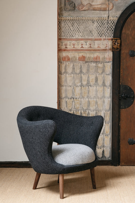 Willadsen Lounge Chair three-quarter view of the dark back and pale seat; original walnut design reference