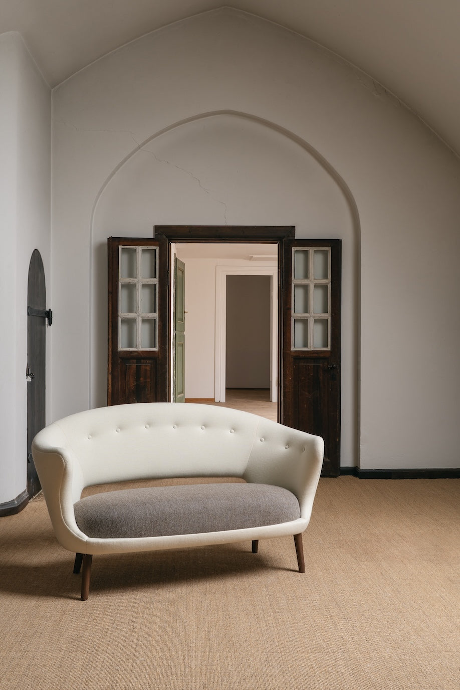 Willadsen two-seater sofa with light back and grey seat, original design reference